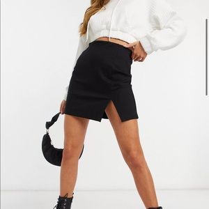 NWT Stradivarius mini skirt with slit hem in black (ASOS)